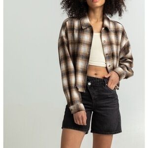 NWT BLANK NYC easy on women’s black denim shorts. Asymmetrical button fly.